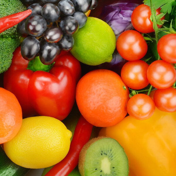 Beautiful bright background from various vegetables and fruits.