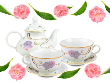 An elegant porcelain service in a floral ornament isolated on a white background.