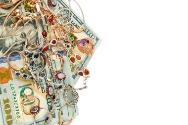 Dollars and jewelry isolated on white background. Free space for text.
