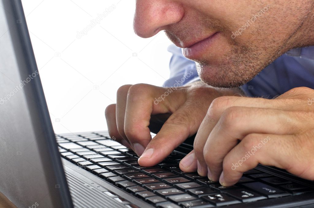 Man typing on keyboard