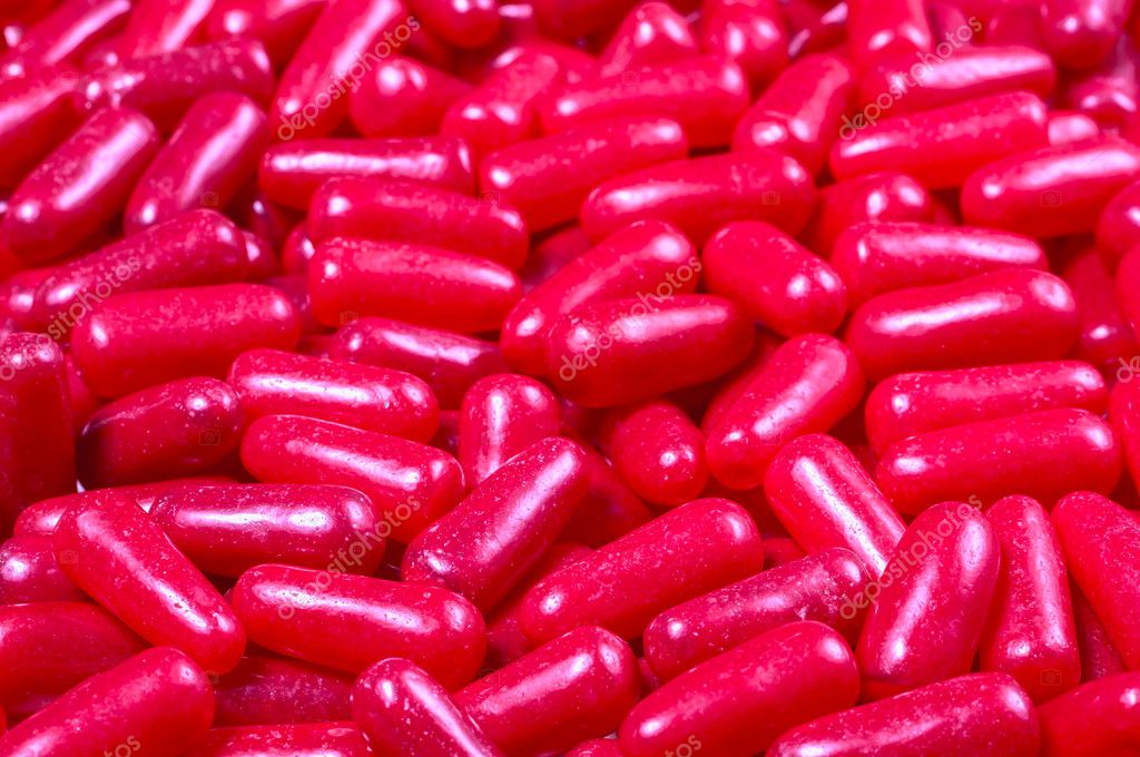 宏的桩有嚼劲的红色果冻糖果的特写– 图库图片