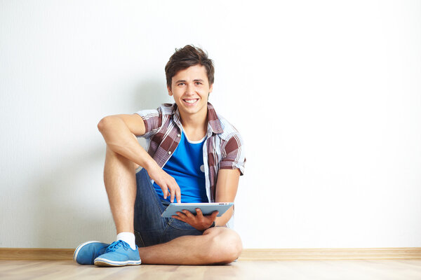 Teenager with touchpad