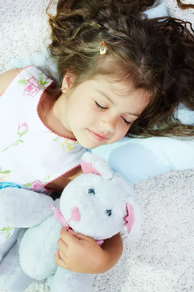 Sleeping with toy — Stock Photo, Image