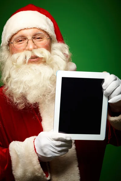 Santa com touchpad — Fotografia de Stock