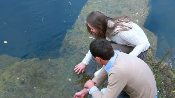 Couple at water — Stock Video