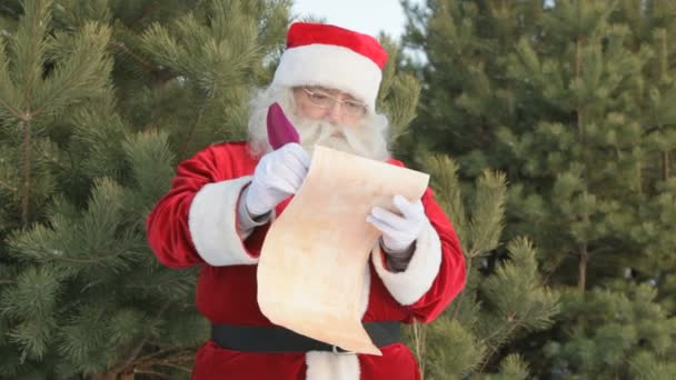 Santa writing letter — Stock Video