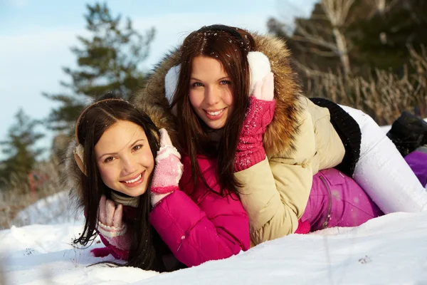 Girls in snowdrift — Stock Photo, Image