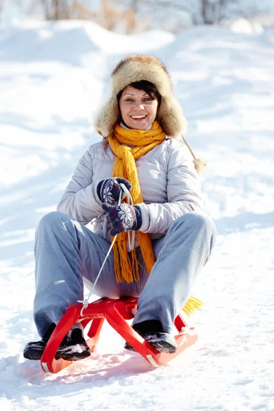 Female on sledges — Stock Photo, Image