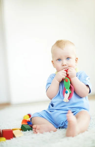 Chłopiec z zabawkami — Zdjęcie stockowe