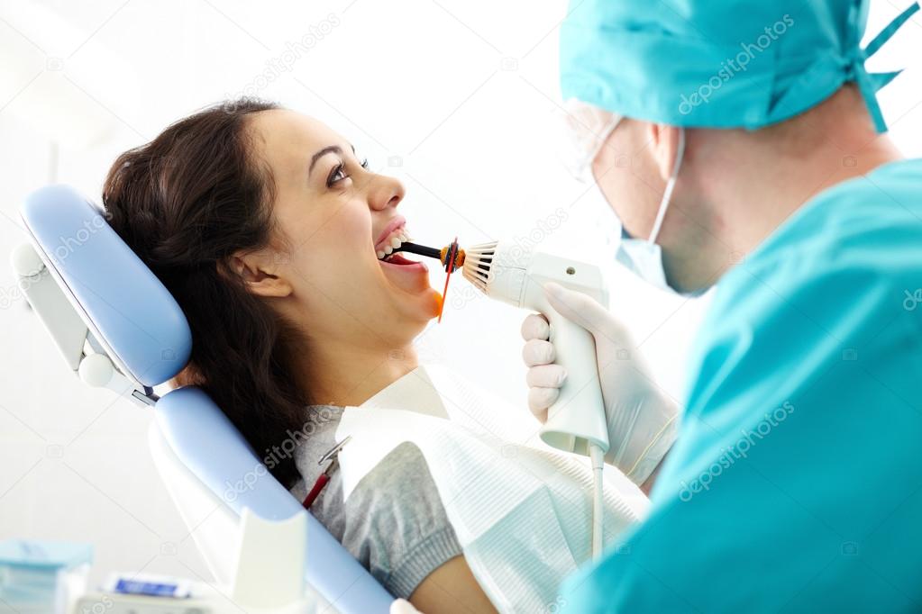 Drying tooth filling Stock Photo by ©pressmaster 25265751