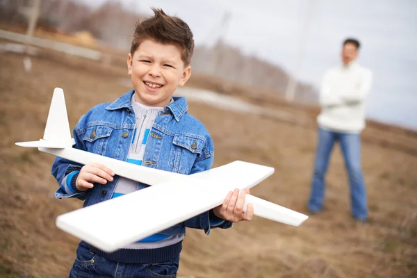 Boy with airplane