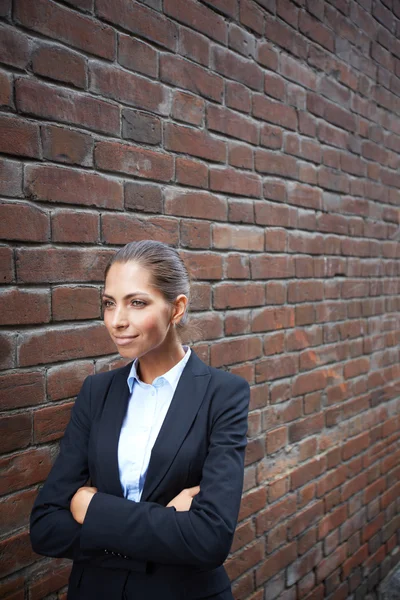 Walking along brick wall — Stock Photo, Image