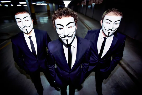 Masked guys Portrait of three guys — Φωτογραφία Αρχείου