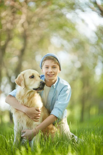 Boy with dog Stock Photo