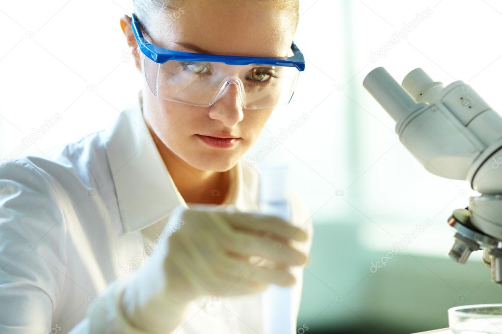 Young chemist working