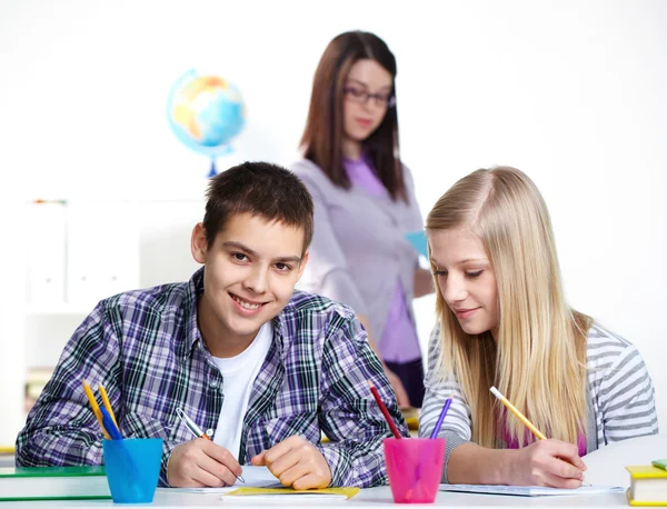 Classmates at lesson Royalty Free Stock Images
