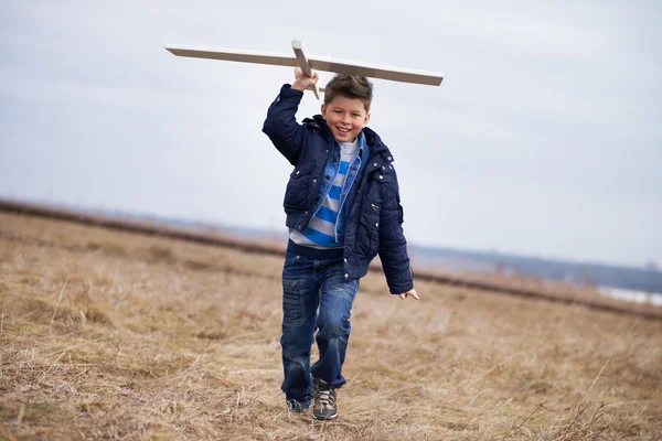 Menino com brinquedo — Fotografia de Stock