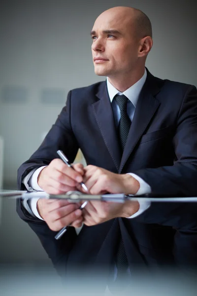 Pensive businessman — Stock Photo, Image