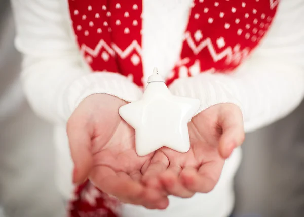 Christmas star on palms — Stock Photo, Image