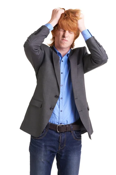 Guy in smart clothes holding his head — Stock Photo, Image