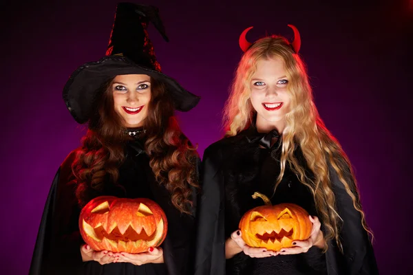 Women with pumpkins — Stock Photo, Image