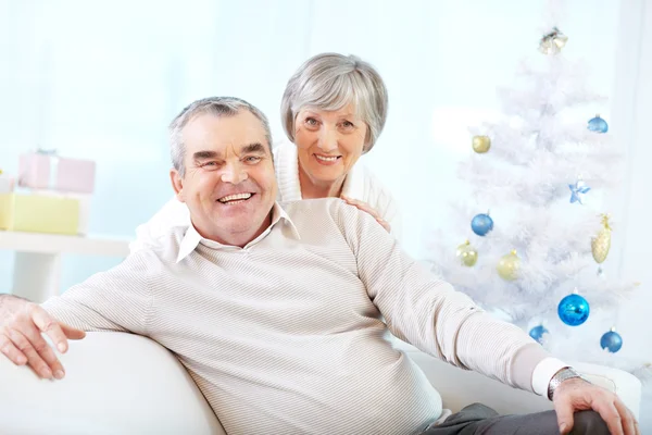 Senior couple at Christmas eve — Stock Photo, Image