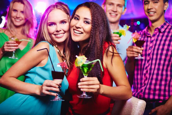 Girls with cocktails Royalty Free Stock Images