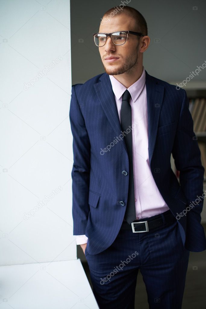 Elegant man in suit and eyeglasses