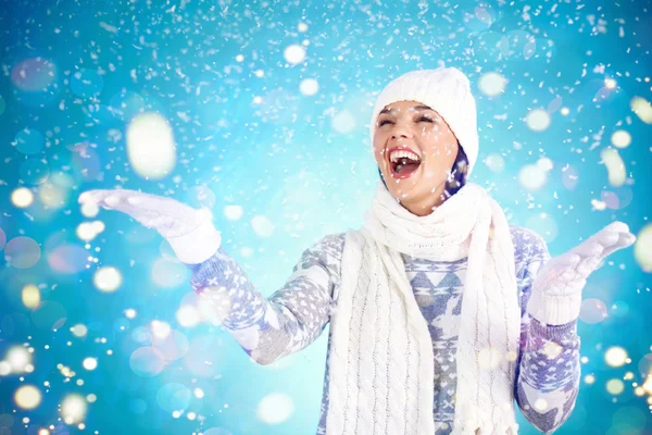 Girl in winterwear enjoying snowfall Royalty Free Stock Photos