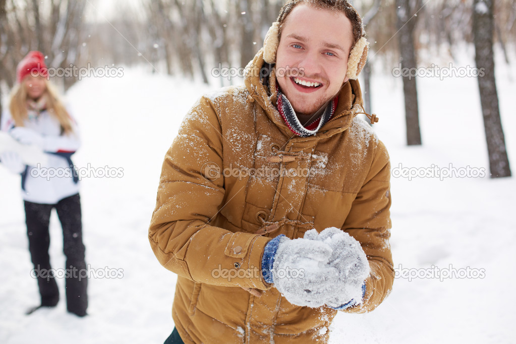 Playful guy in winterwear