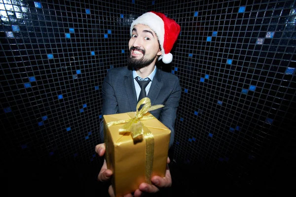 Businessman with gift — Stock Photo, Image
