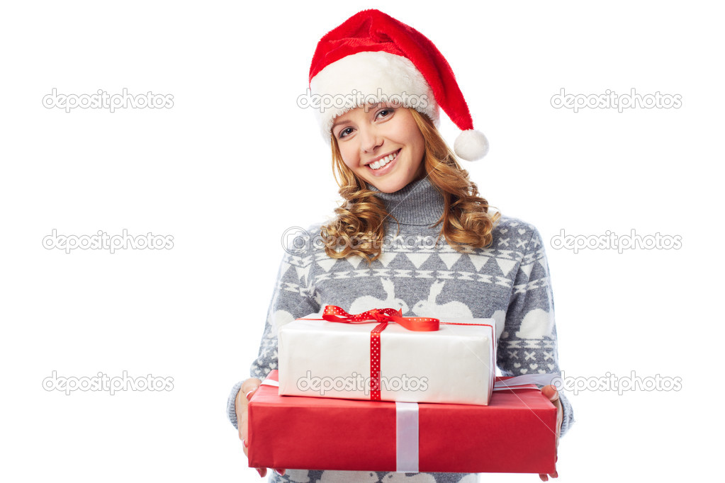 Girl in Santa cap holding giftbox