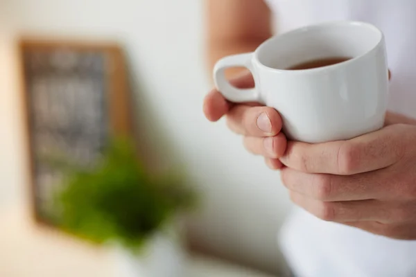 Holding cup — Stock Photo, Image