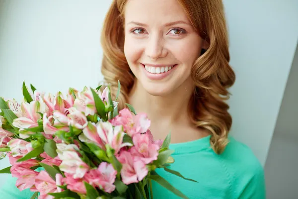 Girl with lilies — Stock Photo, Image