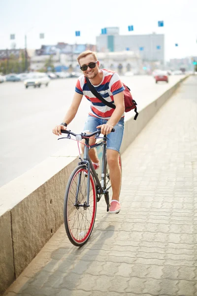 Guy riding bicycle — Stock Photo, Image