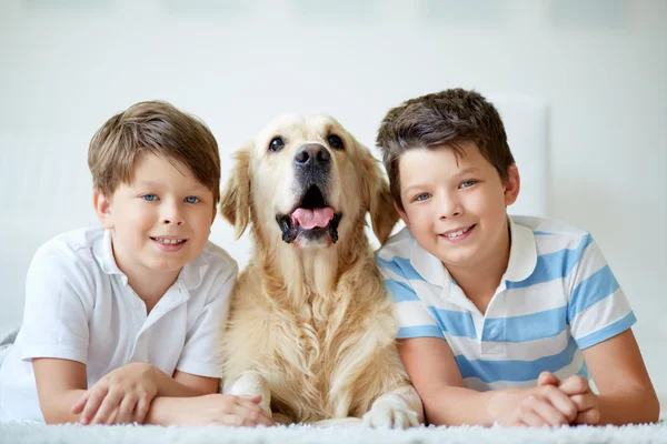 Boys with dog — Stock Photo, Image