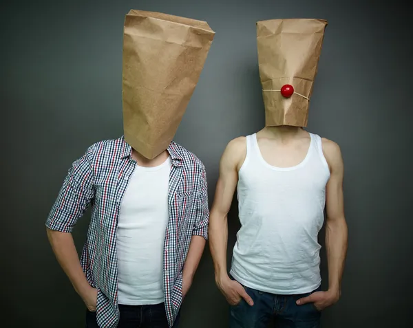 Guys in paper bags — Stock Photo, Image