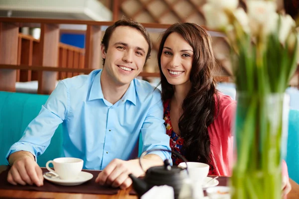 Couple having coffee in cafe Stock Photo