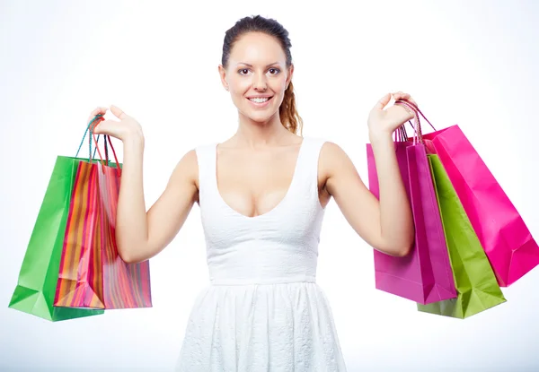 Femme avec des sacs en papier — Photo