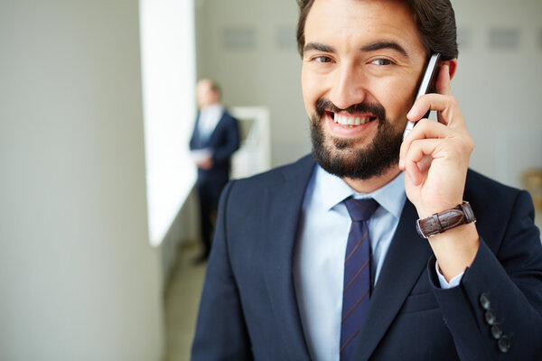 Businessman speaking on phone