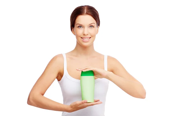 Woman with body lotion — Stock Photo, Image
