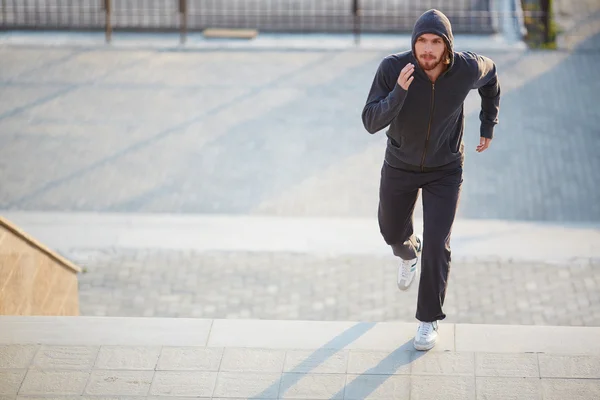 Sportsman running outside — Stock Photo, Image