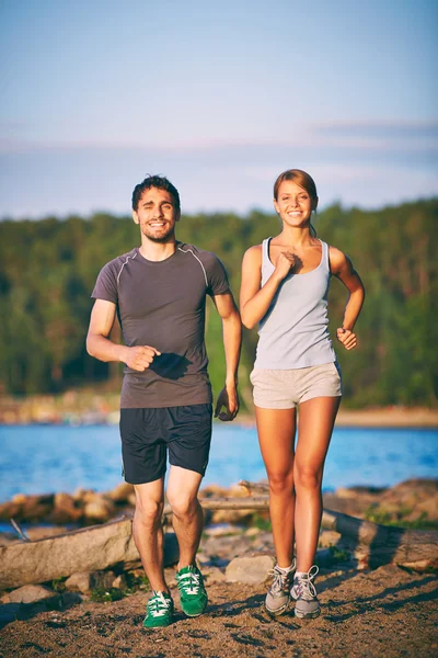 Couple running in the morning — Stock Photo, Image
