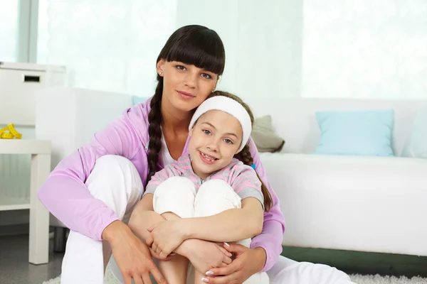 Girl and her mother in sportswear — Stock Photo, Image