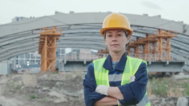 Tracking Portrait Shot Confident Female Supervisor Safety Vest Hard Hat — Stock Video