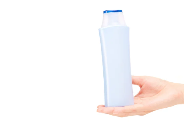 Flasche mit Körperpflegeprodukt auf Handfläche — Stockfoto