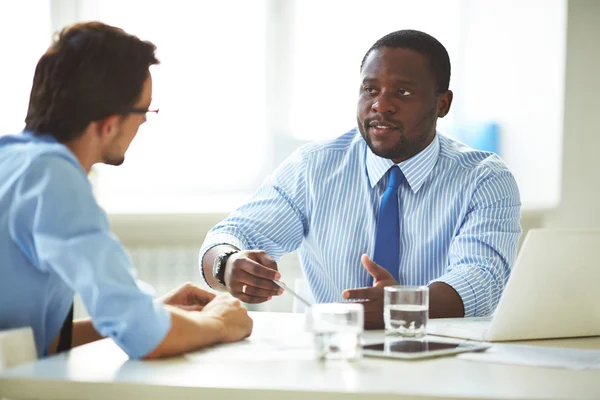 Businessmen interacting at meeting — Stock Photo, Image