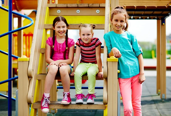 Girls spending time on playground — Stock Photo, Image