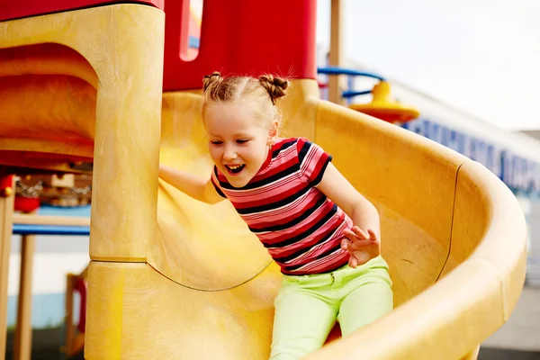 Girl having fun on playground — Stock Photo, Image