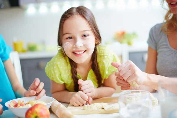 Girl with floured nose — Stock Photo, Image